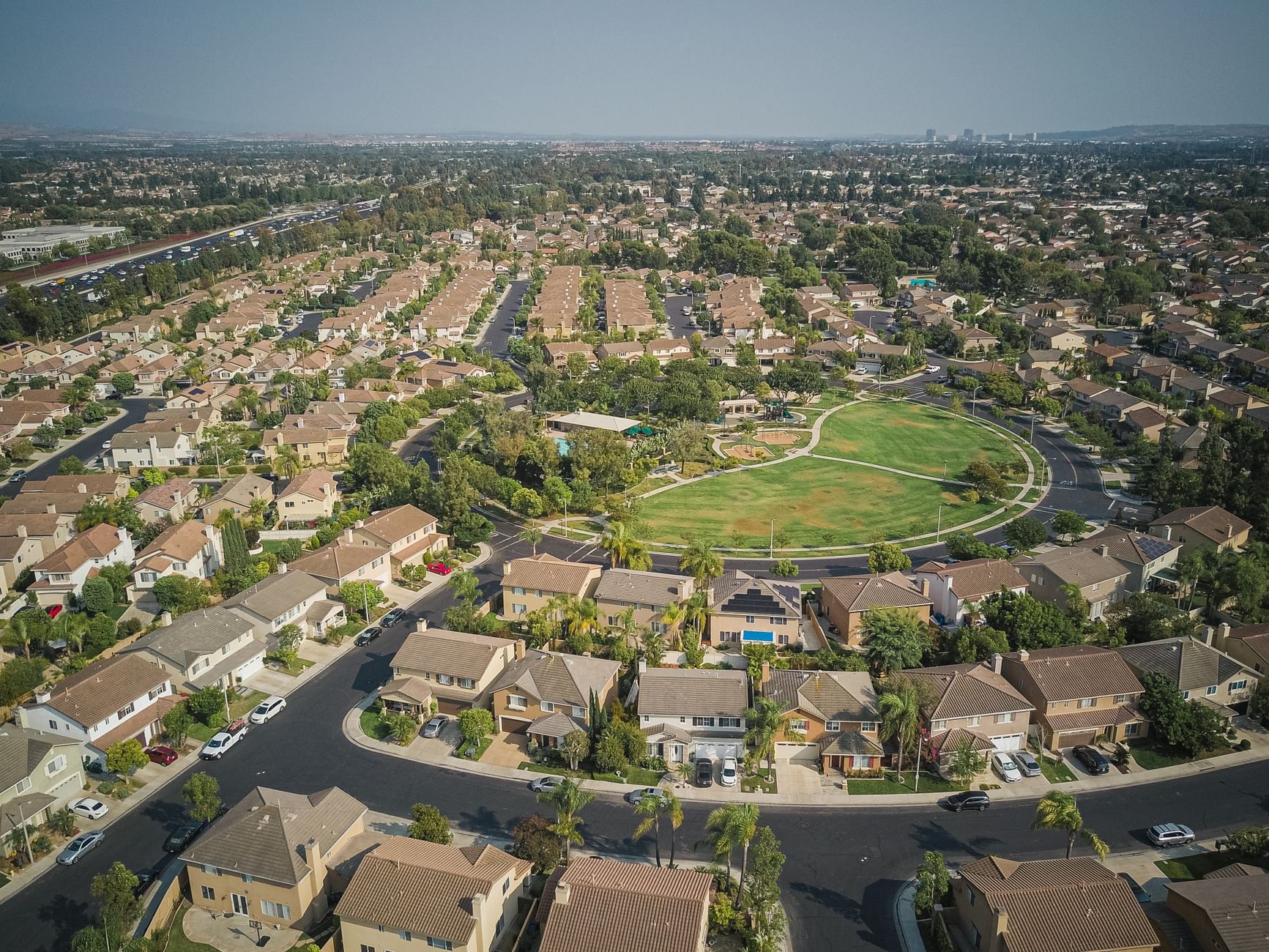 Aerial view of a completed low-rise residential enclave
